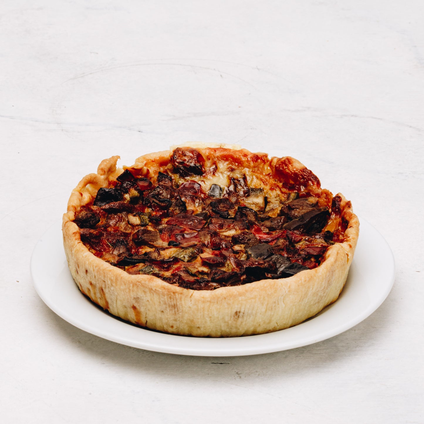 Tarta de zucchini, berenjena, morrón y cebolla